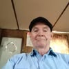 Man wearing a cap indoors